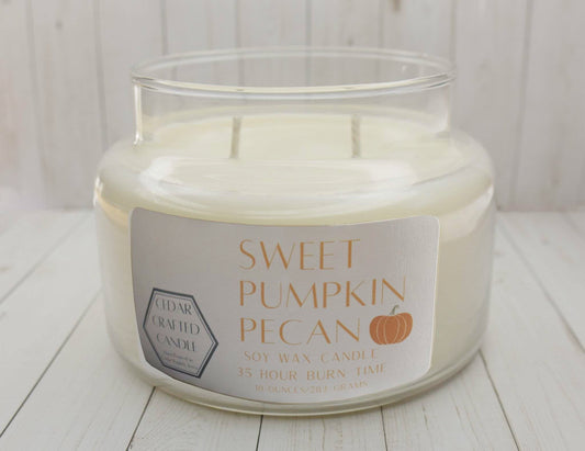 Hand-poured, nontoxic soy candle scented in Sweet Pumpkin Pecan