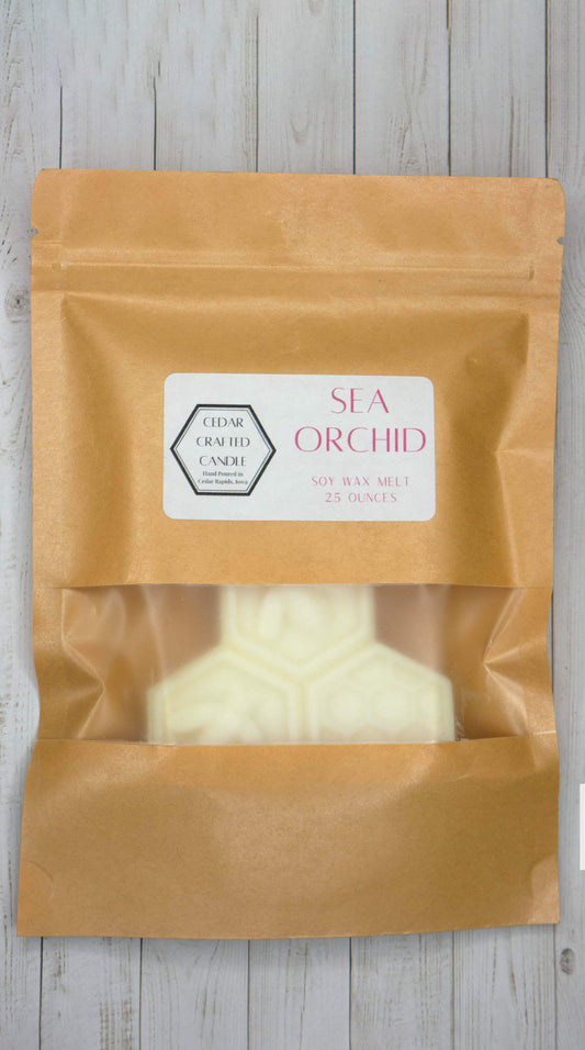 Hand-poured, nontoxic soy wax melts scented in Sea Orchid